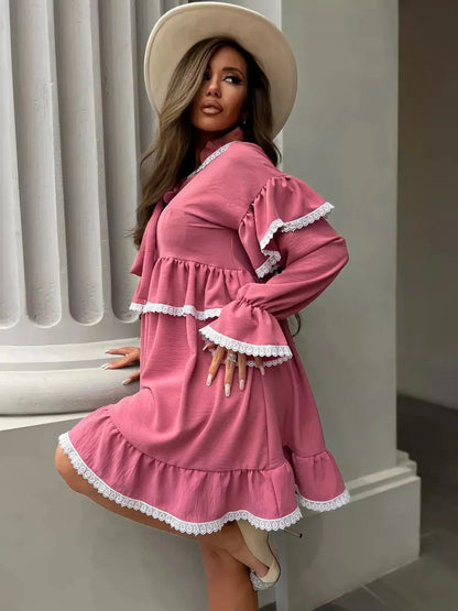 Rosea Mini Dress by Lauven featuring elegant ruffles, lace detail, and a flattering fit in soft pink fabric.