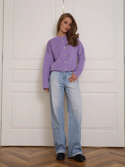Lilac Cardigan by Lauven, warm purple knitwear with button closure, styled with jeans and set against a minimalist background.