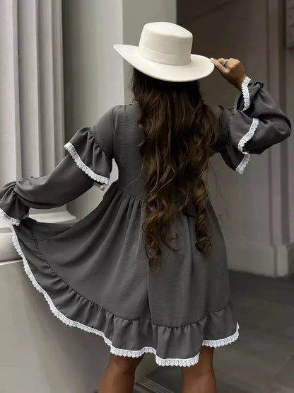 Luna Mini Dress by Lauven featuring elegant ruffled design and lace trim, perfect for stylish women's occasions.