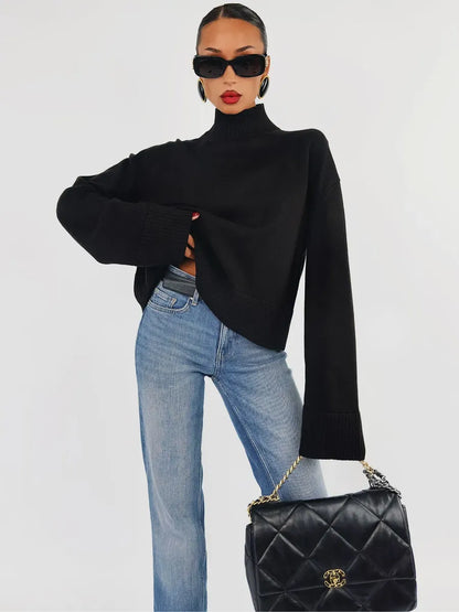 Noir Sweater by Lauven - Oversized black cotton blend knit styled with high-waisted jeans and chic accessories.