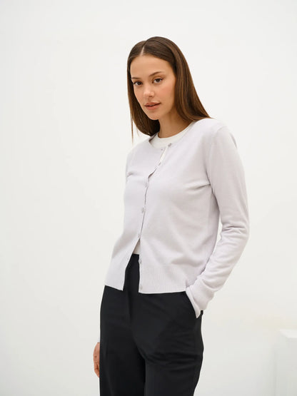 Elegant Luna Cardigan by Lauven in soft grey knitwear with classic button closure, perfect for versatile styling.