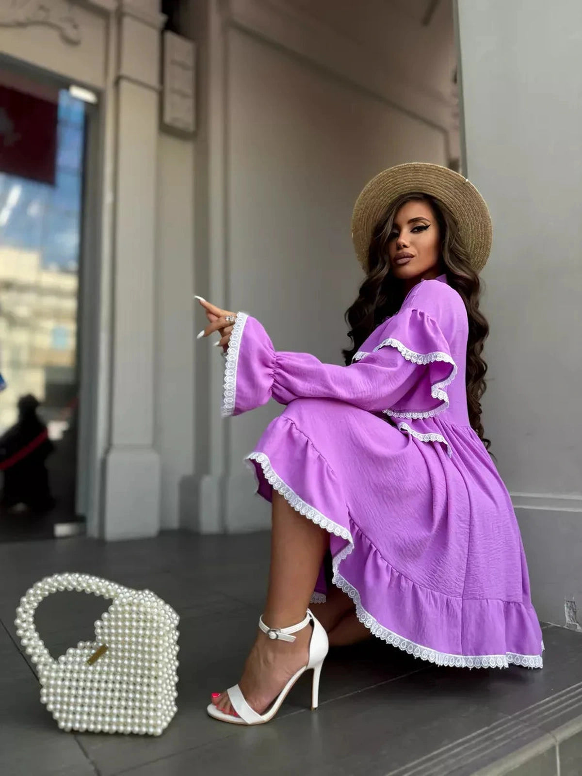 Violetta Mini Dress by Lauven, featuring delicate lace details and flowing ruffles in lilac, perfect for stylish women.