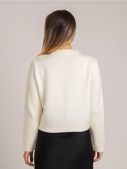 Ivory Cardigan by Lauven, featuring a stylish back view of a creamy white short loose fit knit.