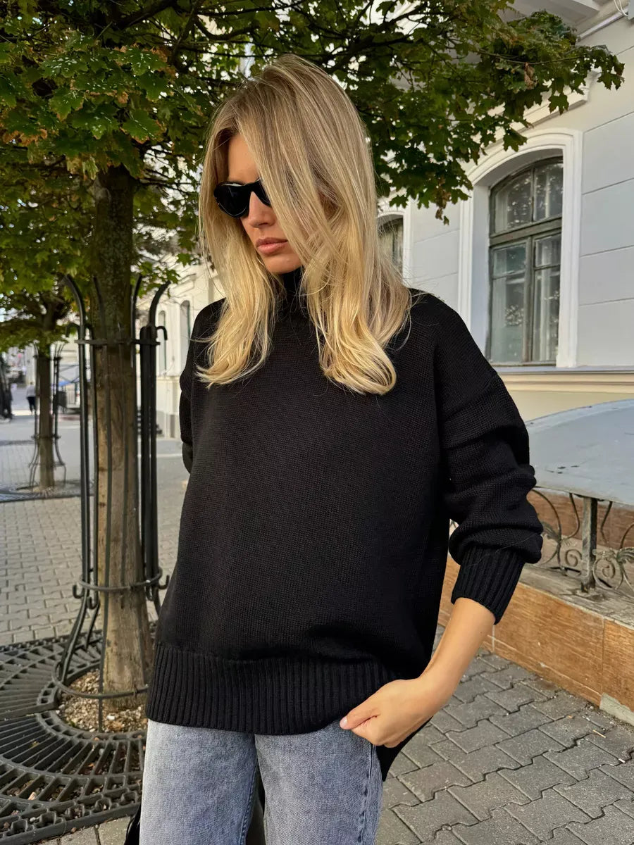 Nyra Sweater by Lauven - Oversized black women's wool knit sweater with high turtleneck, perfect for cool seasons.