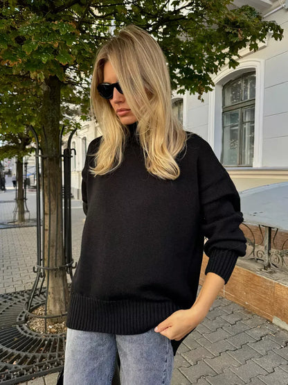 Nyra Sweater by Lauven - Oversized black women's wool knit sweater with high turtleneck, perfect for cool seasons.