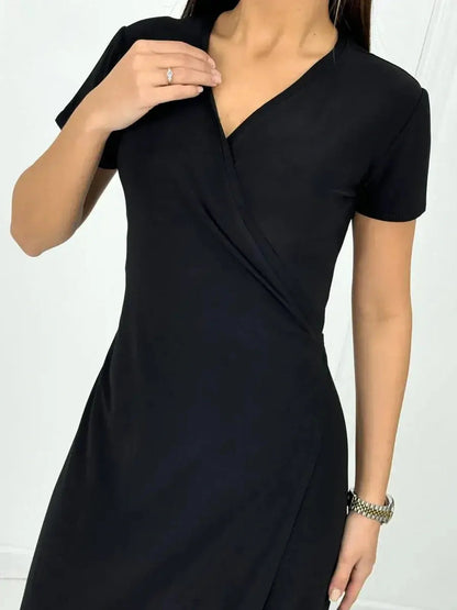 Elegant Obsidian Grace Maxi Dress showcasing a flattering wrap silhouette in soft black fabric, perfect for any occasion.