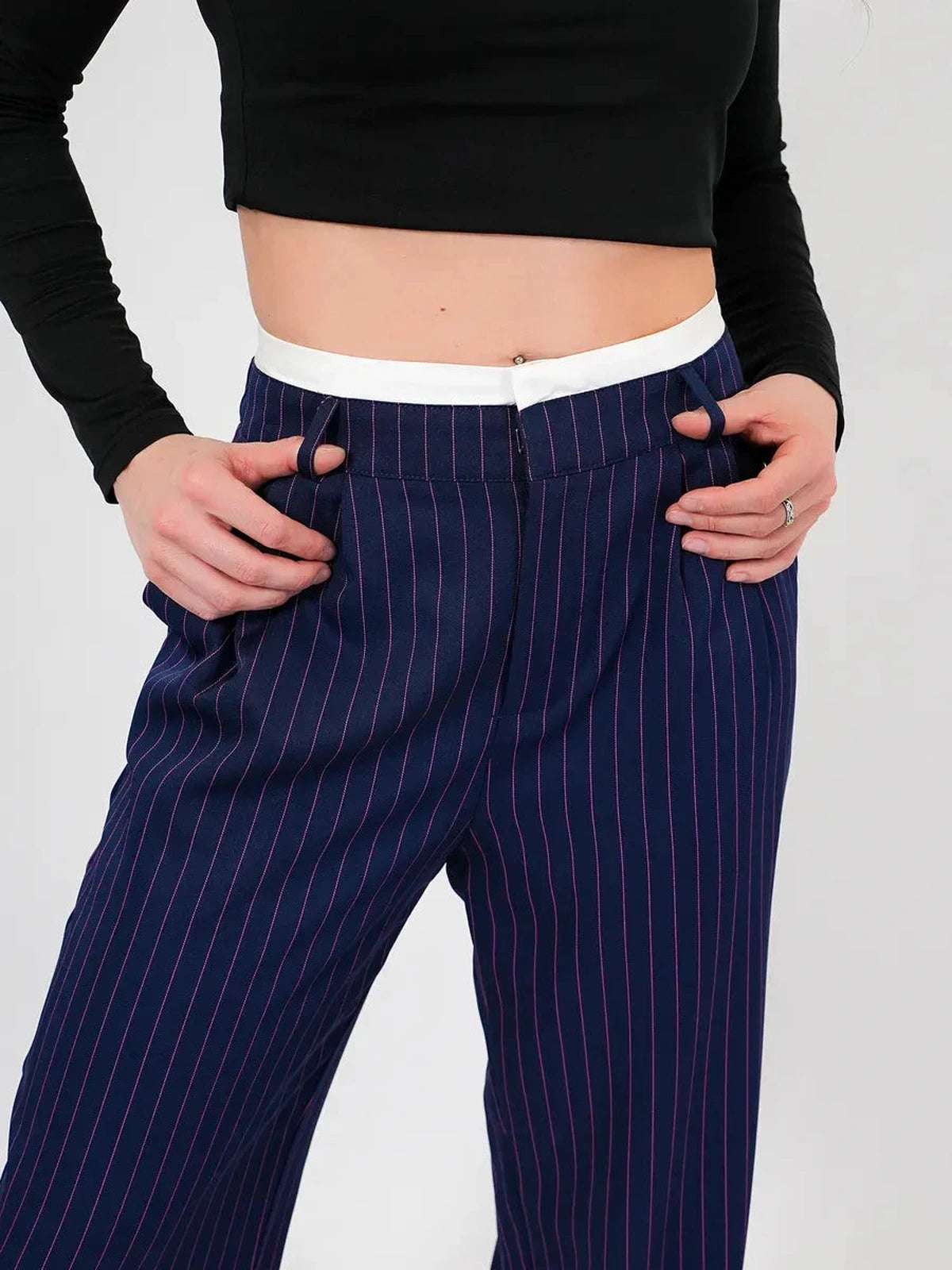Aster Pants by Lauven featuring a high-waist wide-leg silhouette in elegant navy pinstripes.