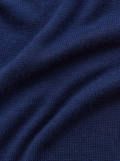 Deep navy knit fabric showcasing the texture of the Celeste Sweater by Lauven, a cozy oversized women’s wool knit.