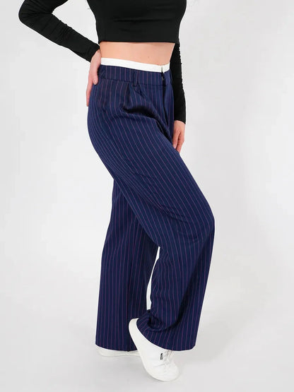 Aster Pants by Lauven featuring refined high-waist wide-leg silhouette in navy pinstripes.