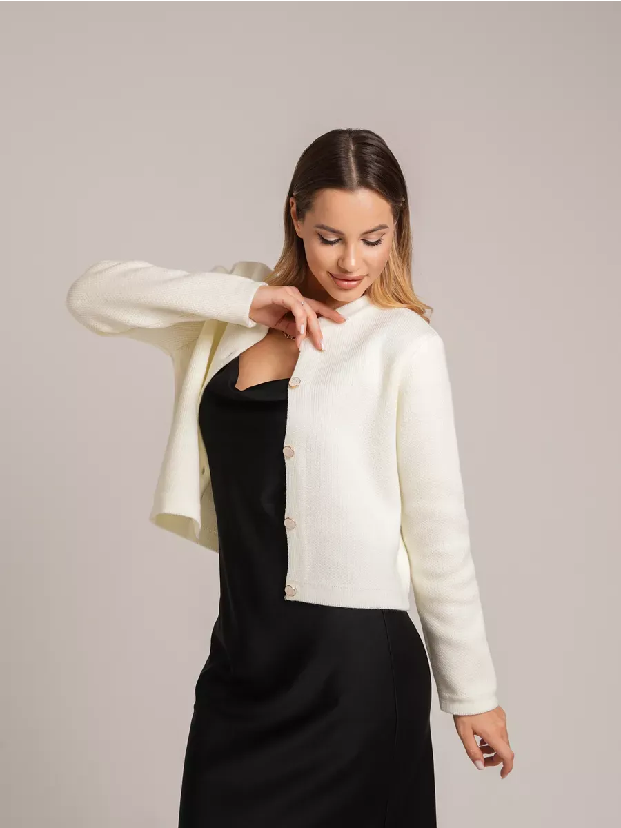 Ivory Cardigan by Lauven — Chic creamy white short cardigan with decorative buttons and a relaxed fit.