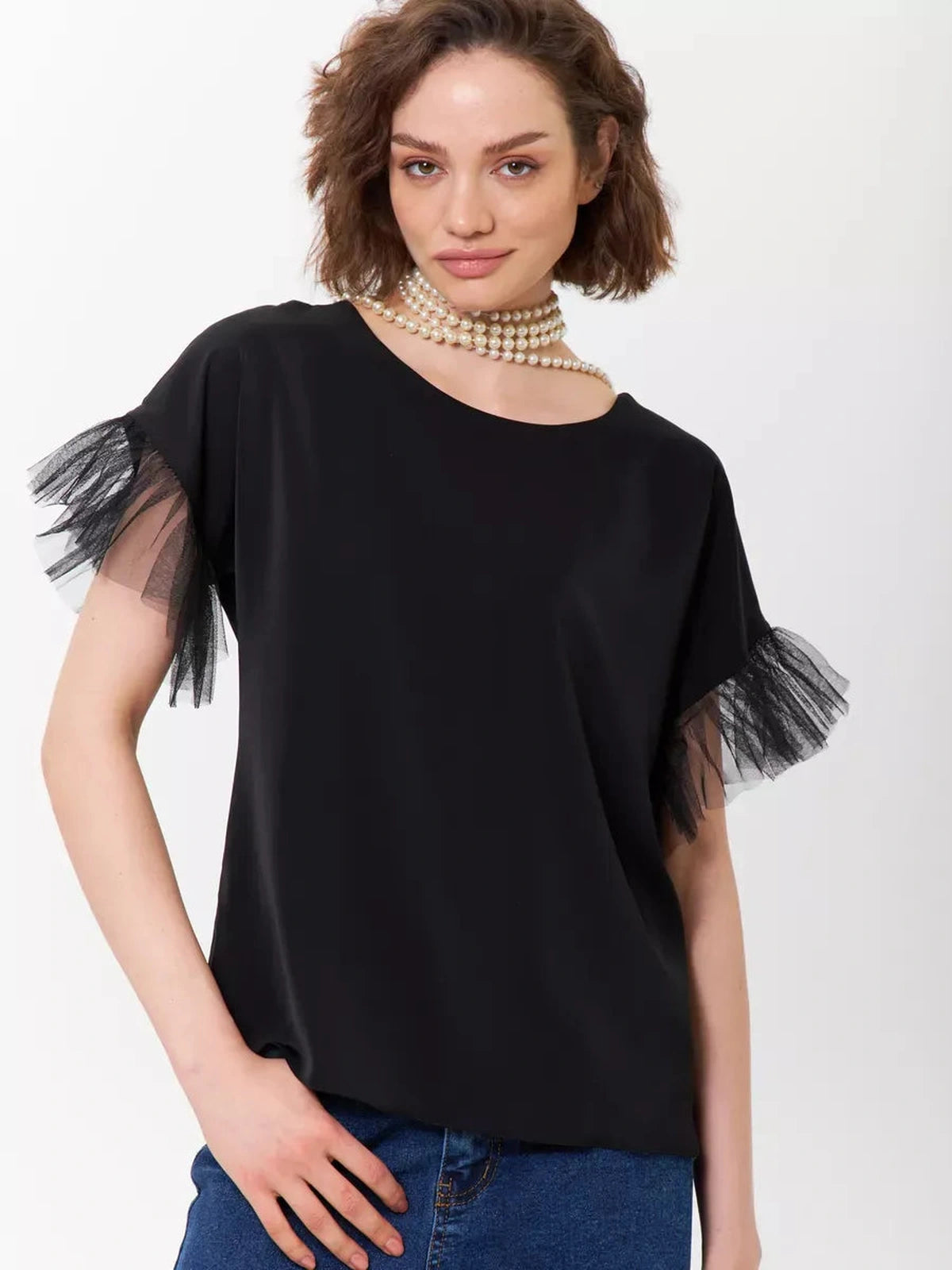 Noiré Blouse by Lauven - Elegant black blouse featuring tulle ruffle sleeves for sophisticated style.