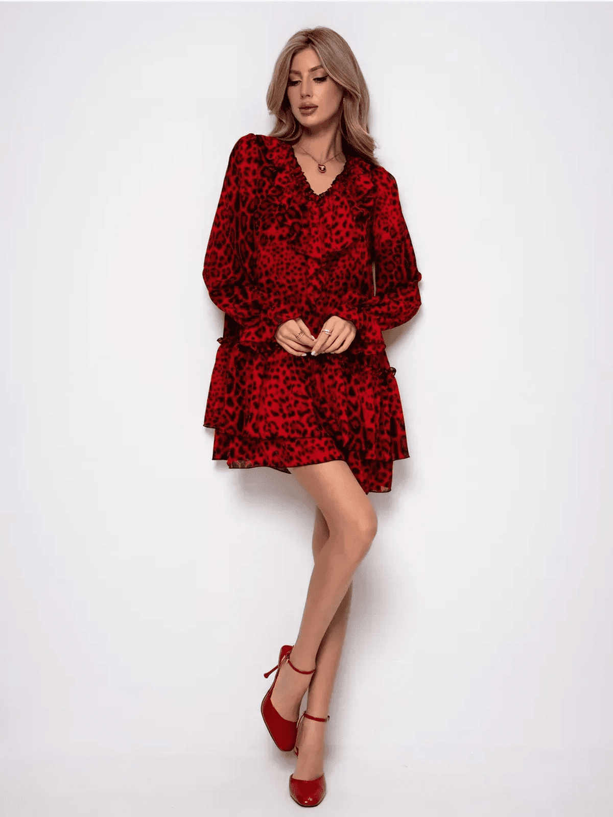 Savanna Mini Dress by Lauven showcasing a red leopard chiffon design, perfect for bold and elegant style.