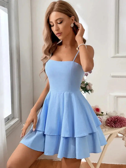 Sky Petal Mini Dress in light blue, featuring a corset bodice and tiered skirt, perfect for summer elegance.