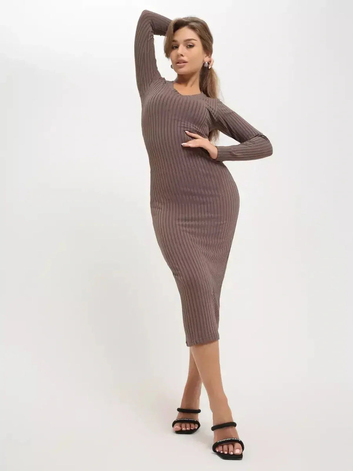 Contour Midi Dress in ribbed knit, showcasing a sleek silhouette and elegant style perfect for versatile wear.
