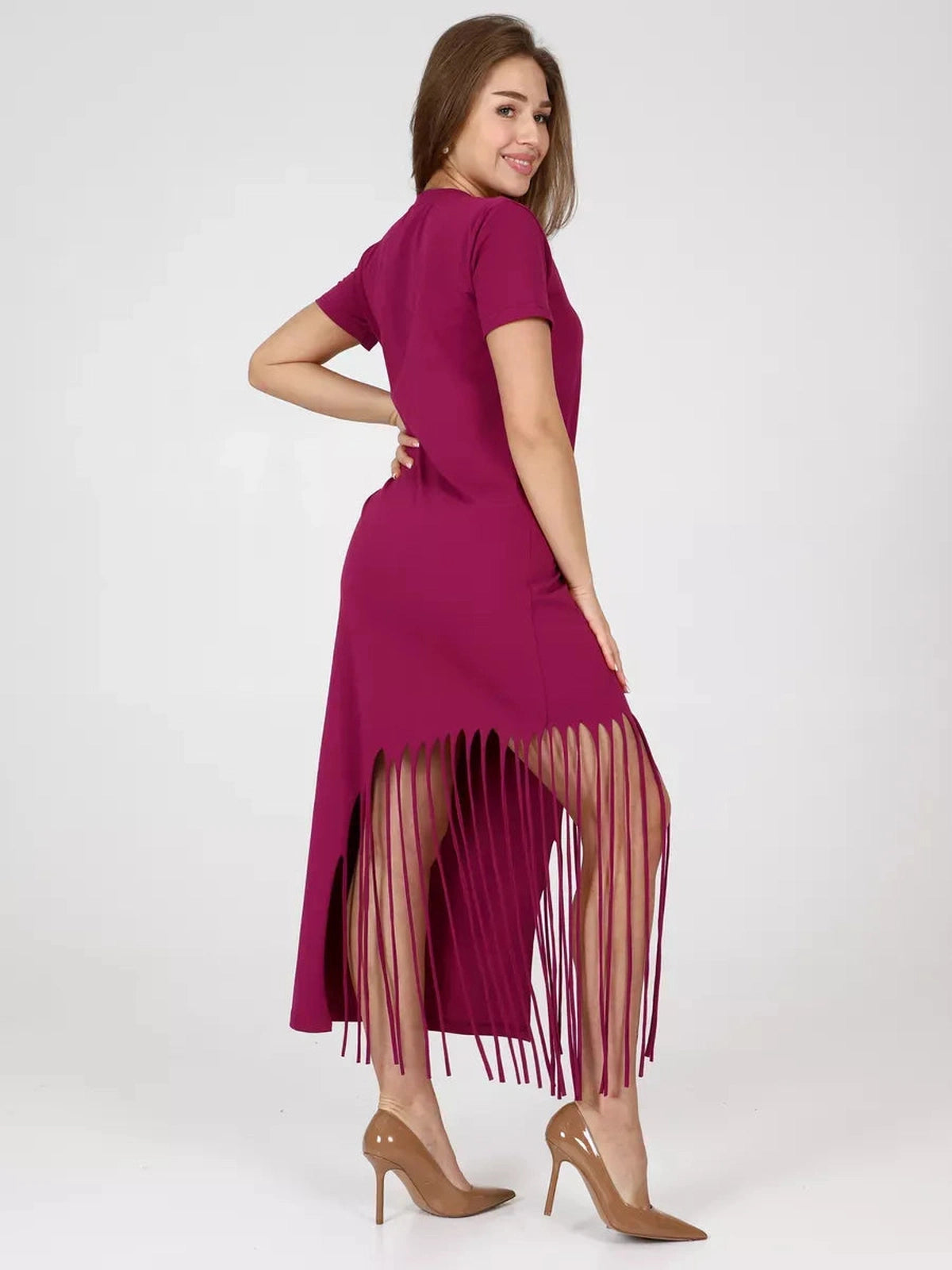 Riviera Midi Dress by Lauven featuring a playful fringe hem in a vibrant fuchsia color.
