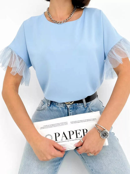 Celeste Blouse by Lauven, light blue silky top with tulle details, perfect for stylish casual outfits.