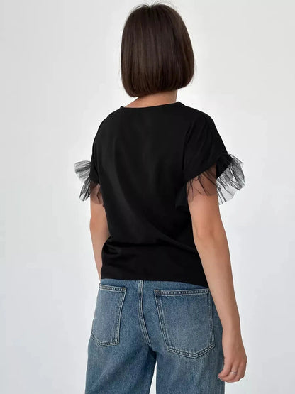 Noiré Blouse by Lauven - Elegant short sleeve black blouse with tulle ruffle detail, showcased from the back.