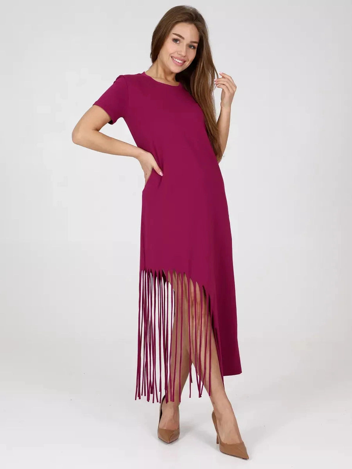 Riviera Midi Dress by Lauven, showcasing a cotton jersey design with fringe hem and relaxed fit in vibrant magenta.