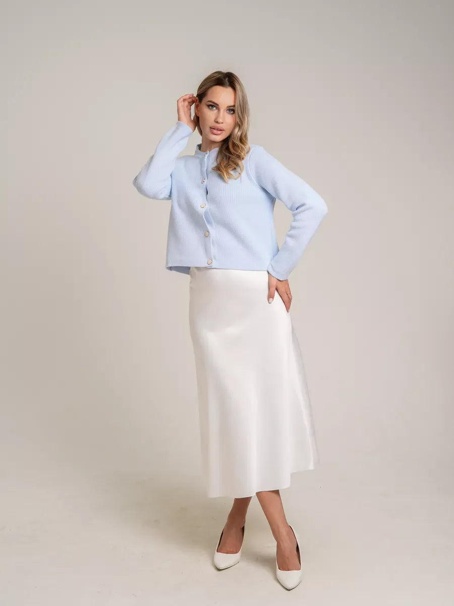 Celeste Cardigan by Lauven, light blue short loose fit knit with decorative buttons, perfect for autumn elegance.