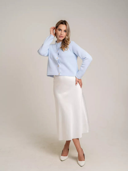 Celeste Cardigan by Lauven, light blue short loose fit knit with decorative buttons, perfect for autumn elegance.