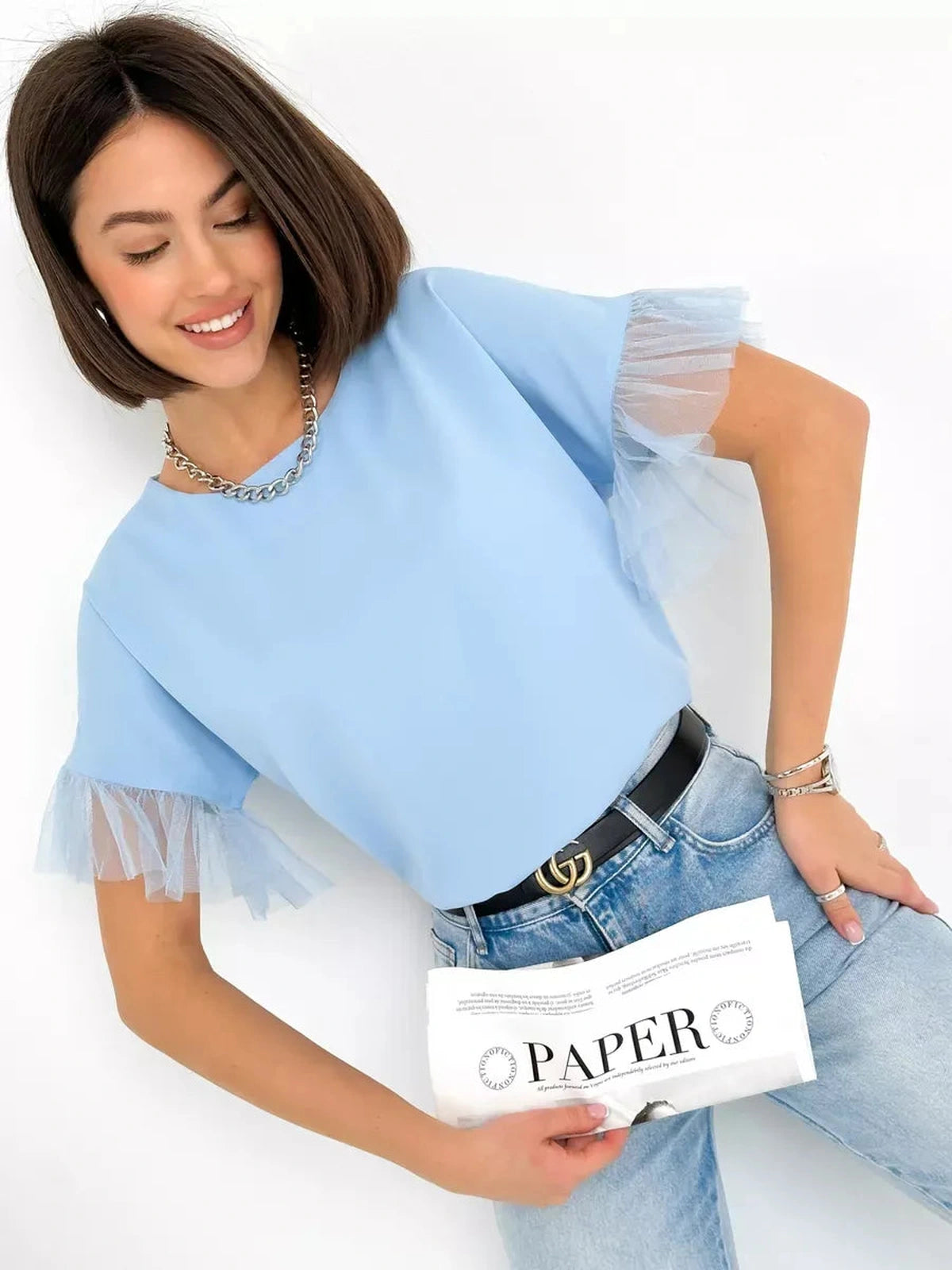 Celeste Blouse from Lauven - Light blue silky short sleeve top with tulle details worn casually.
