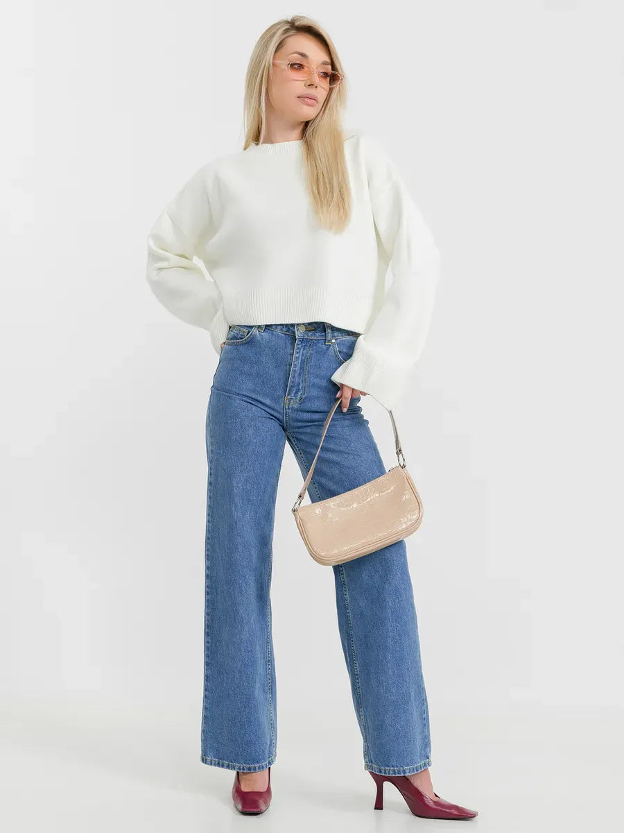 Luna Sweater by Lauven styled with wide-leg jeans and a handbag for a chic look.