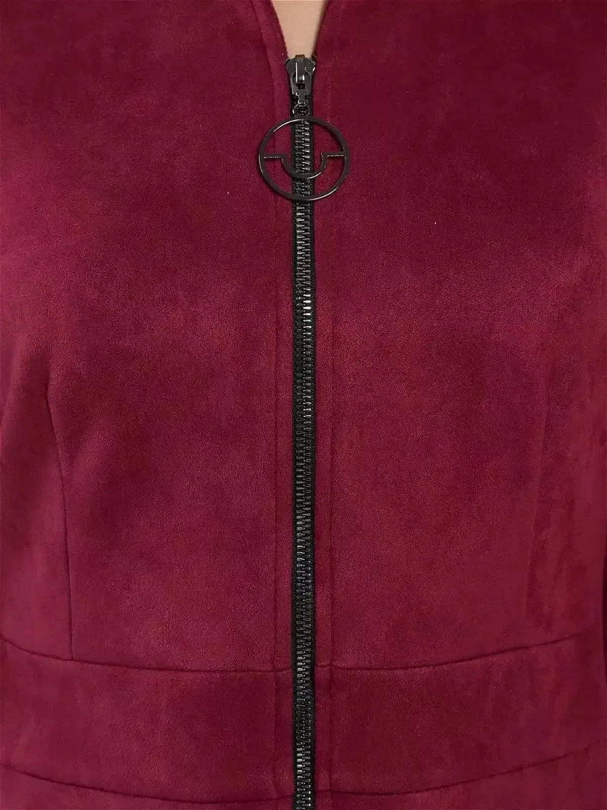 Close-up of the zipper detail on the Lauven Meridian Mini Dress in burgundy, showcasing modern elegance.