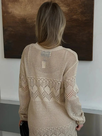 Woman wearing Verona Maxi Dress by Lauven, showcasing elegant beige crochet knit from the back.