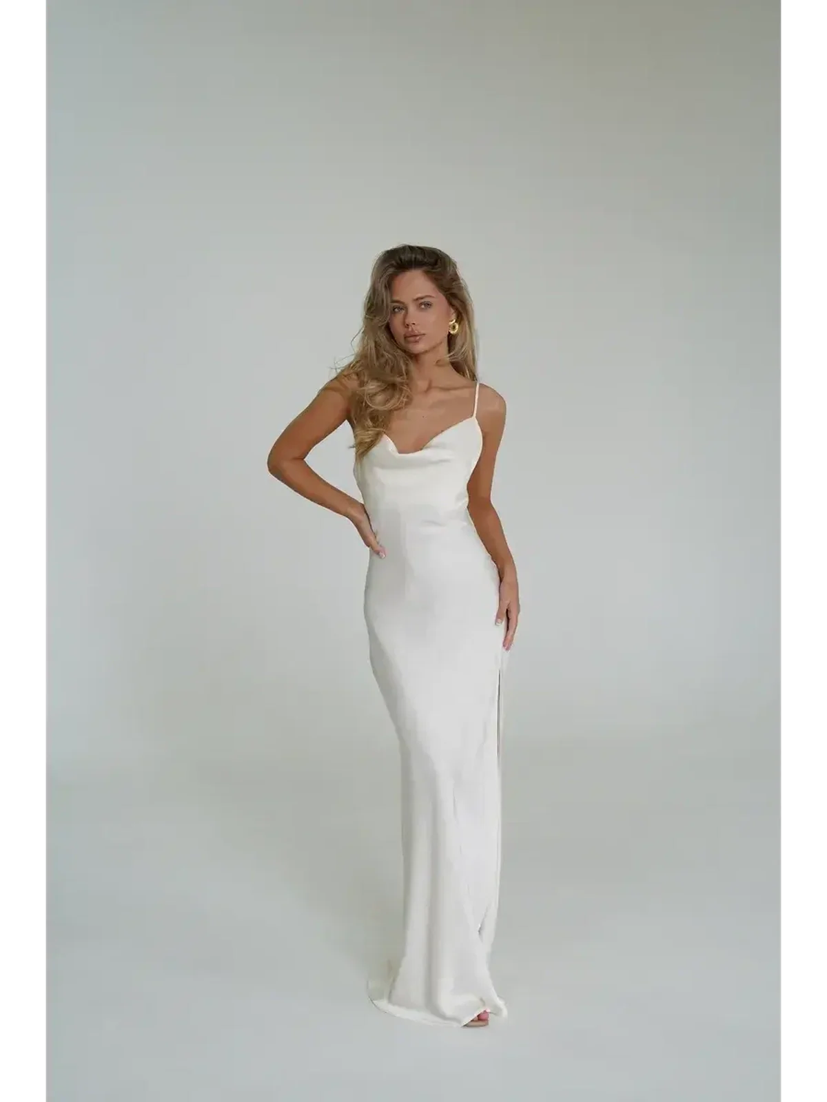 Ivory Luxe Maxi Dress featuring a cowl neckline and side slit, perfect for summer elegance and style.