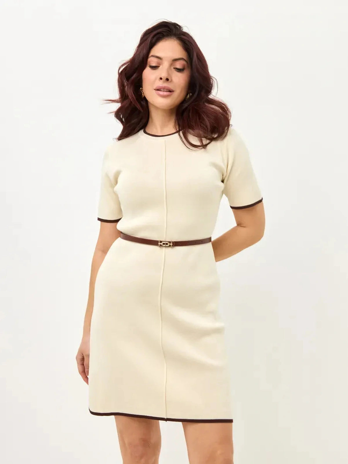 Marbella Mini Dress by Lauven in soft neutral tones, featuring a polished A-line silhouette and breathable knit.