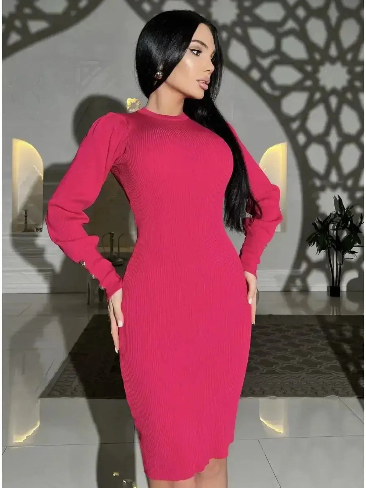 Fuchsia Form: Curve-enhancing pink ribbed knit mini dress with puffed sleeves and button accents.