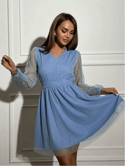 Celeste Mini Dress by Lauven in Tiffany blue chiffon with sheer polka dot sleeves, showcasing a flattering V-neckline.