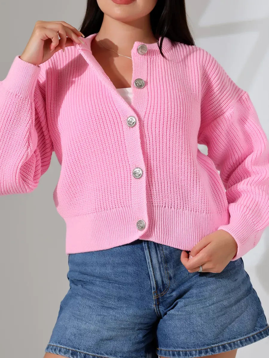 Flora Cardigan by Lauven in soft pink knitwear with classic round neckline and button-front closure.