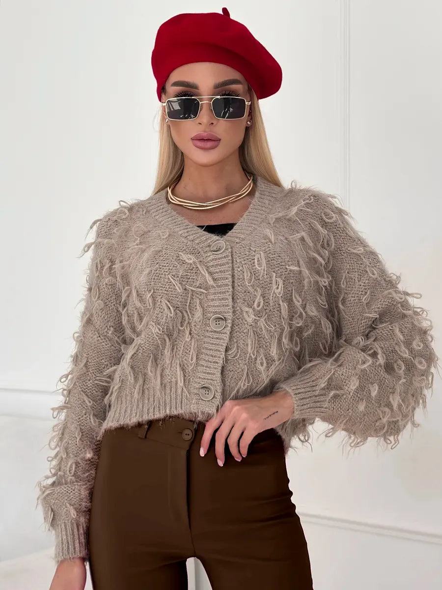 Sahara Cardigan by Lauven - Cropped oversized beige bouclé knit with feathered fringe for a trendy and cozy style.
