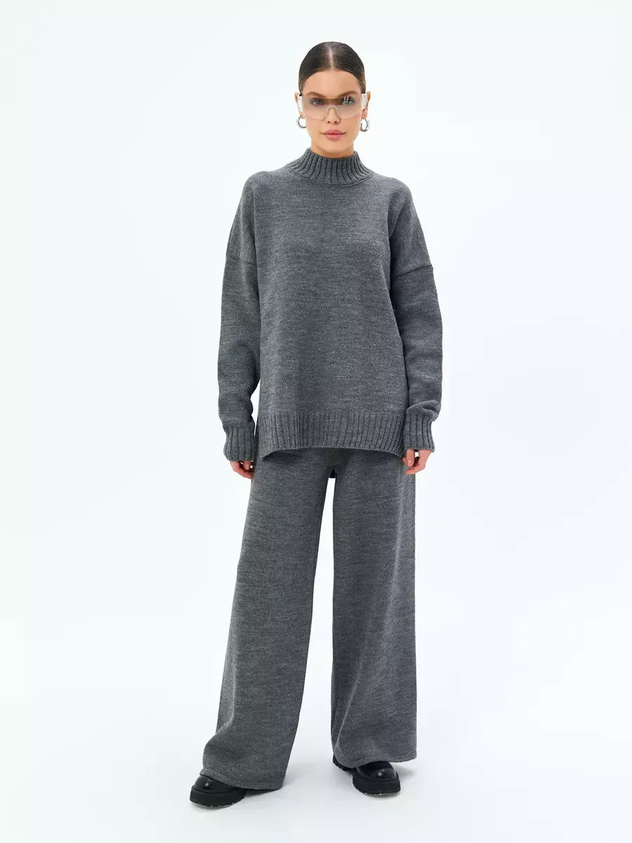 Orion Sweater by Lauven in oversized wool blend knit, shown in graphite gray for stylish fall layering.