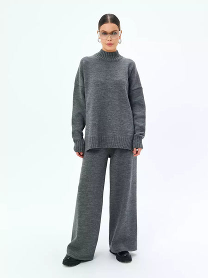 Orion Sweater by Lauven in oversized wool blend knit, shown in graphite gray for stylish fall layering.