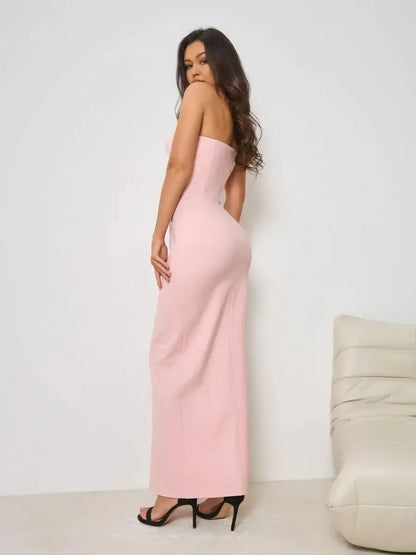 Celestia Maxi Dress by Lauven, showcasing a sculpted bodice and elegant silhouette in soft powder-pink.