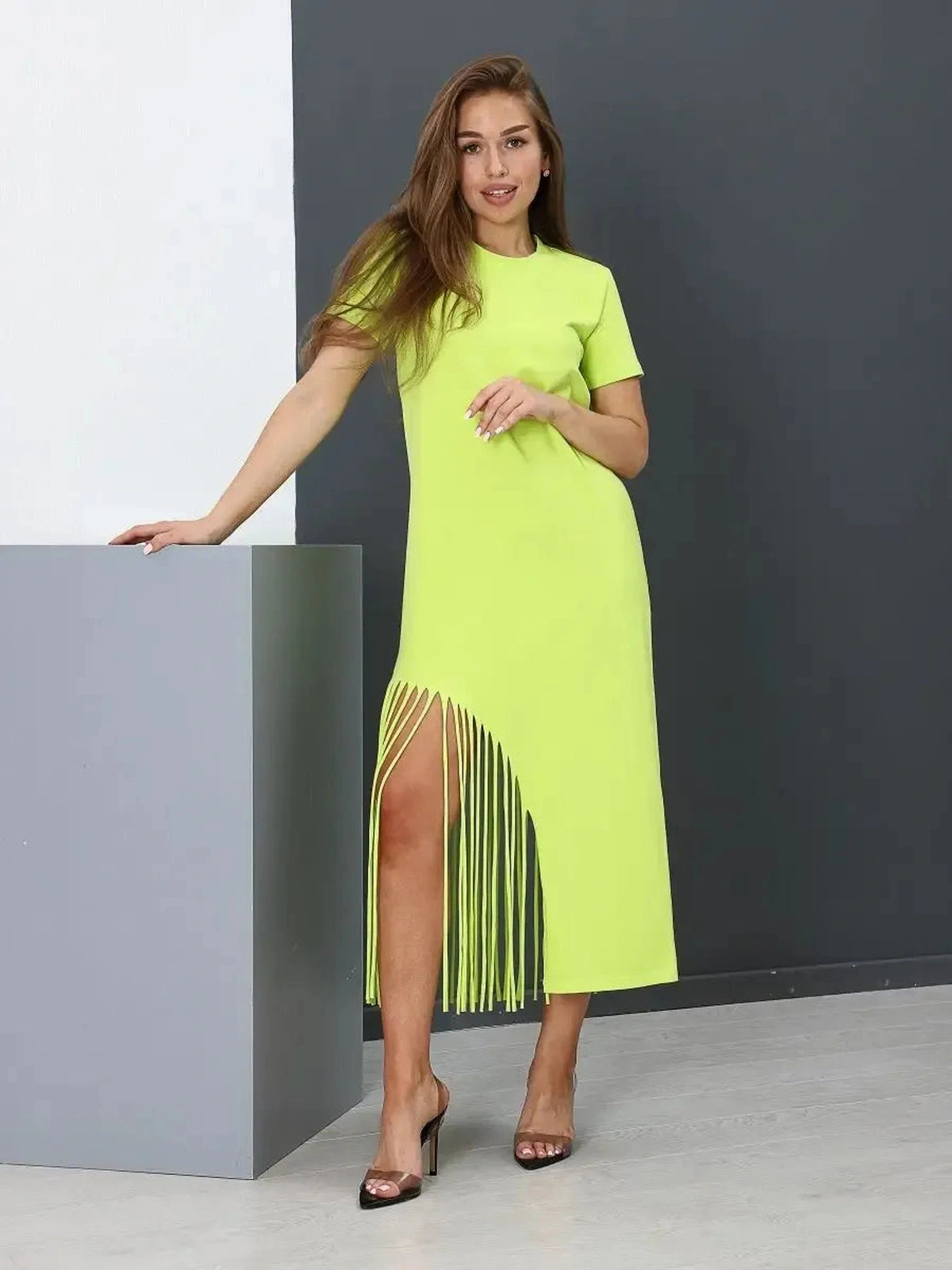 Luma Midi Dress by Lauven, a lime cotton dress with fringe hem and relaxed fit, perfect for stylish summer outings.