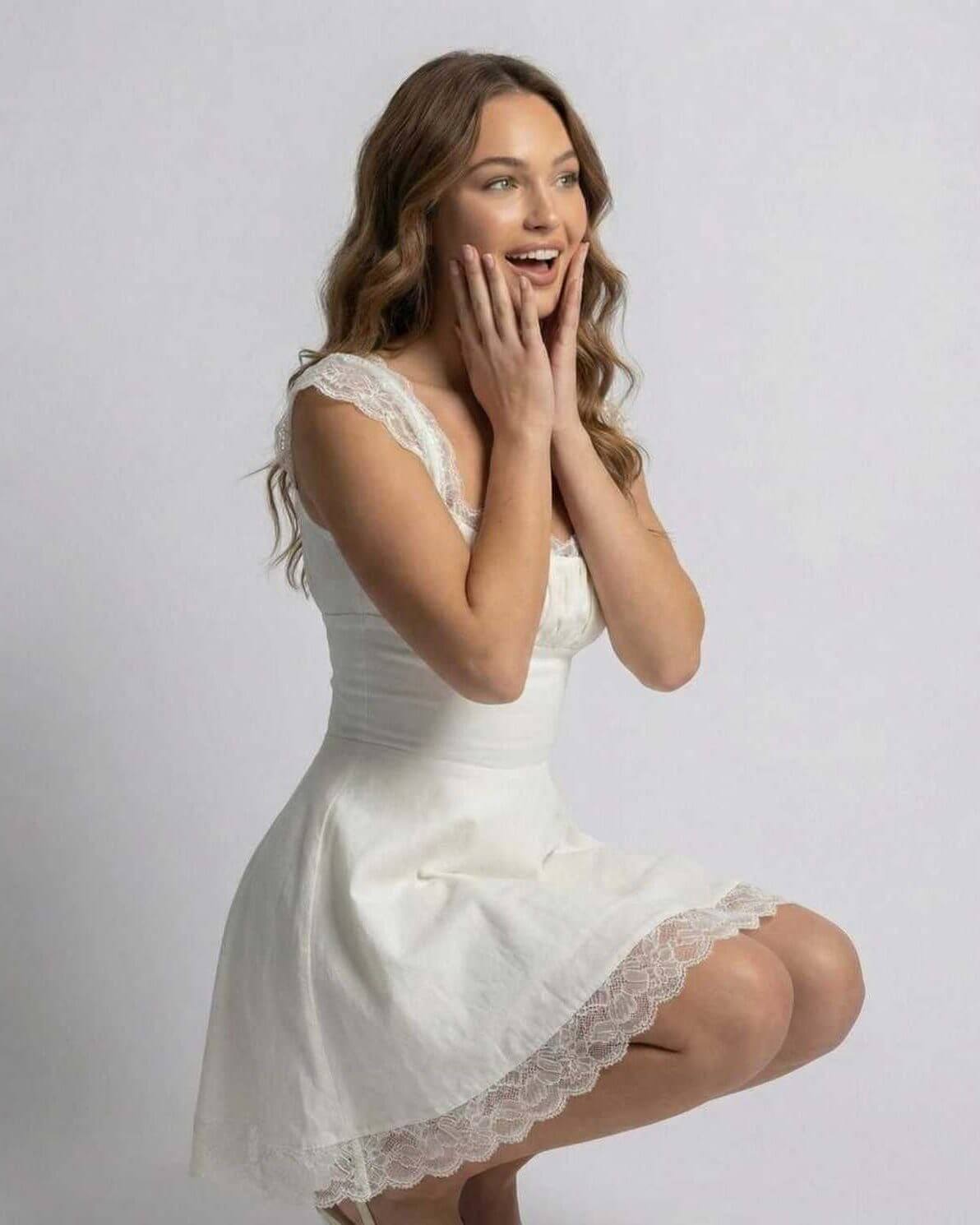 Isla Mini Dress by Lauven, featuring lace details and a flattering slim fit in pristine white.