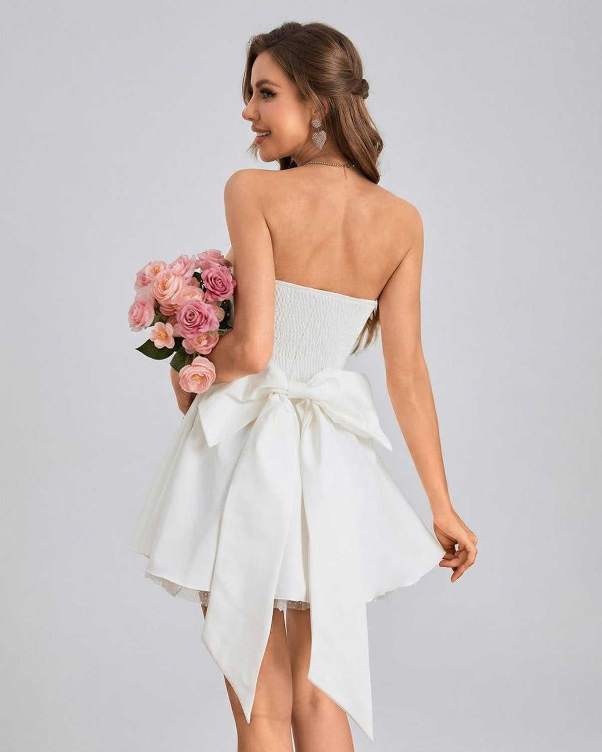 Ivoria Mini Dress by Lauven - Strapless high-waist mini dress with soft volume and bow detail.