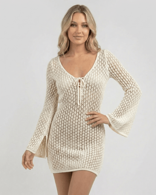 Lauven Ivory Cover Up featuring a crochet knit design, long flared sleeves and flattering front tie neckline.
