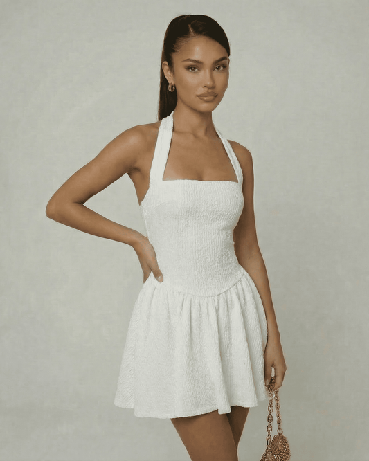 Ivory Mini Dress by Lauven featuring a sequin A-line design and halter neckline for a sophisticated look.