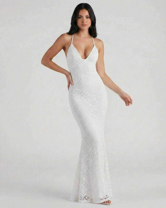 Ivorya Maxi Dress by Lauven featuring lace V-neck and trumpet silhouette on a model.