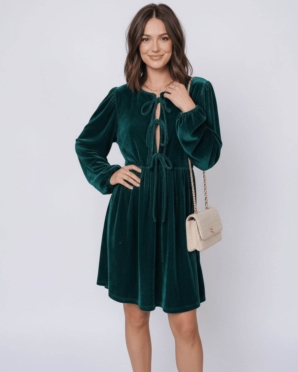 Jade Mini Dress by Lauven, featuring emerald velvet, lantern sleeves, and a relaxed waist for a chic style.
