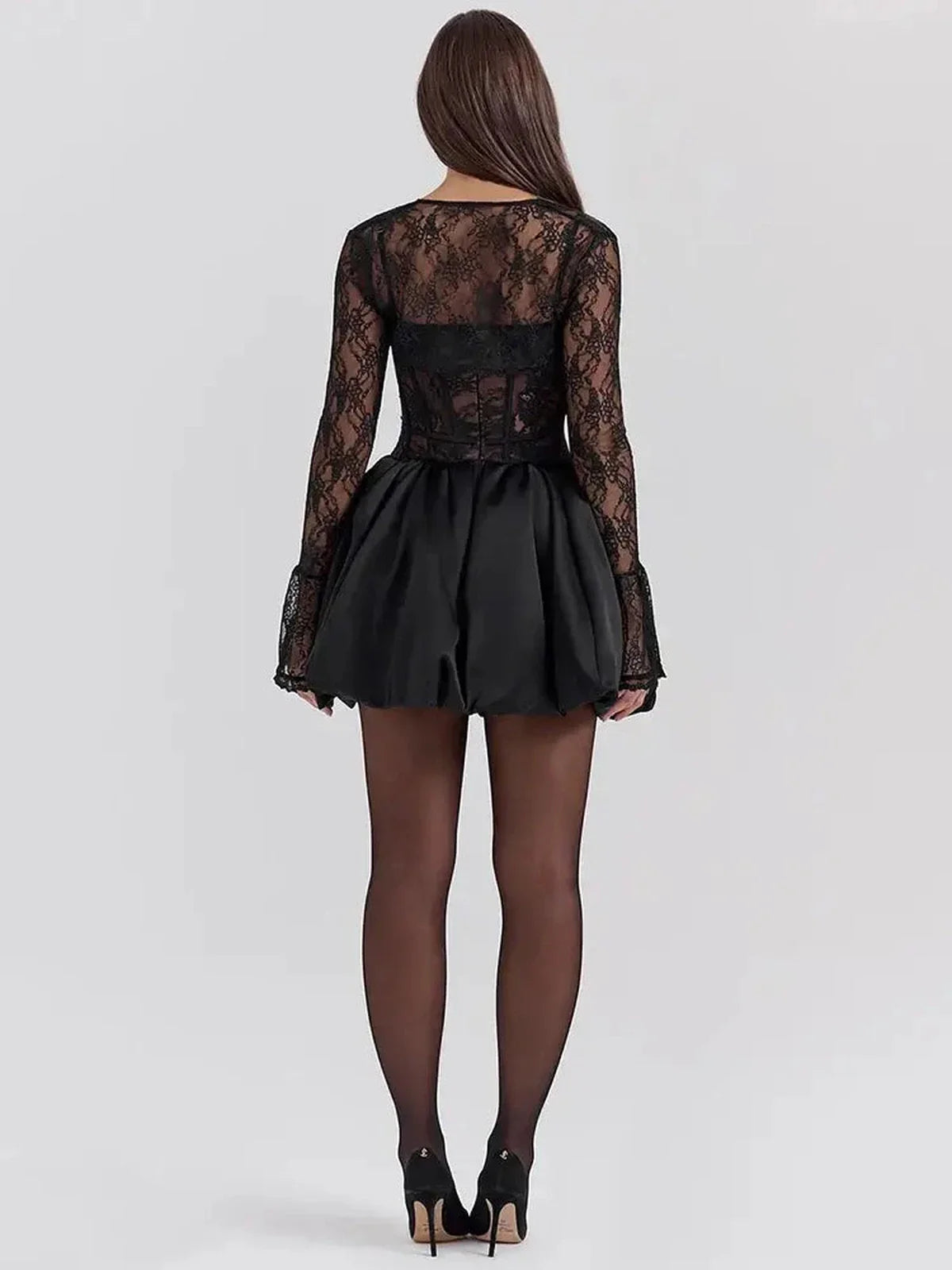Back view of a black lace mini dress with a flared skirt, perfect for evening gowns or cocktail parties.