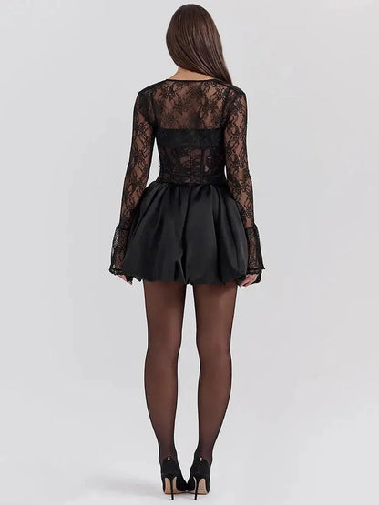 Back view of a black lace mini dress with a flared skirt, perfect for evening gowns or cocktail parties.