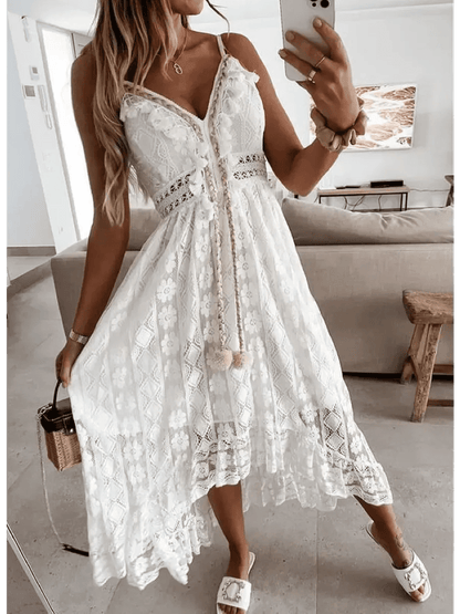 Woman wearing a Lace Muse Maxi Dress featuring intricate lacework and a breezy silhouette, perfect for warm-weather elegance.