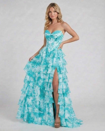 Lauven Lagoon Maxi Dress in turquoise floral design, featuring tiered chiffon skirt and strapless corset bodice.
