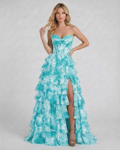 Lagoon Maxi Dress by Lauven in vibrant turquoise floral tiered chiffon, featuring strapless corset bodice and flowing skirt.