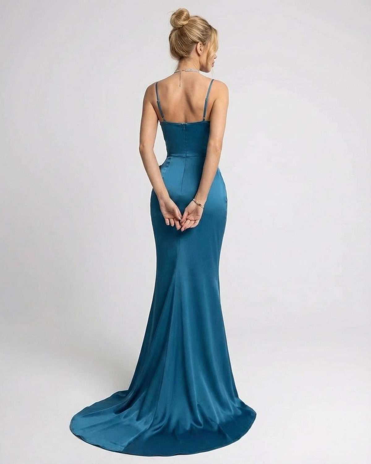 Back view of Laguna Maxi Dress by Lauven, showcasing the sleek teal fabric and elegant silhouette.